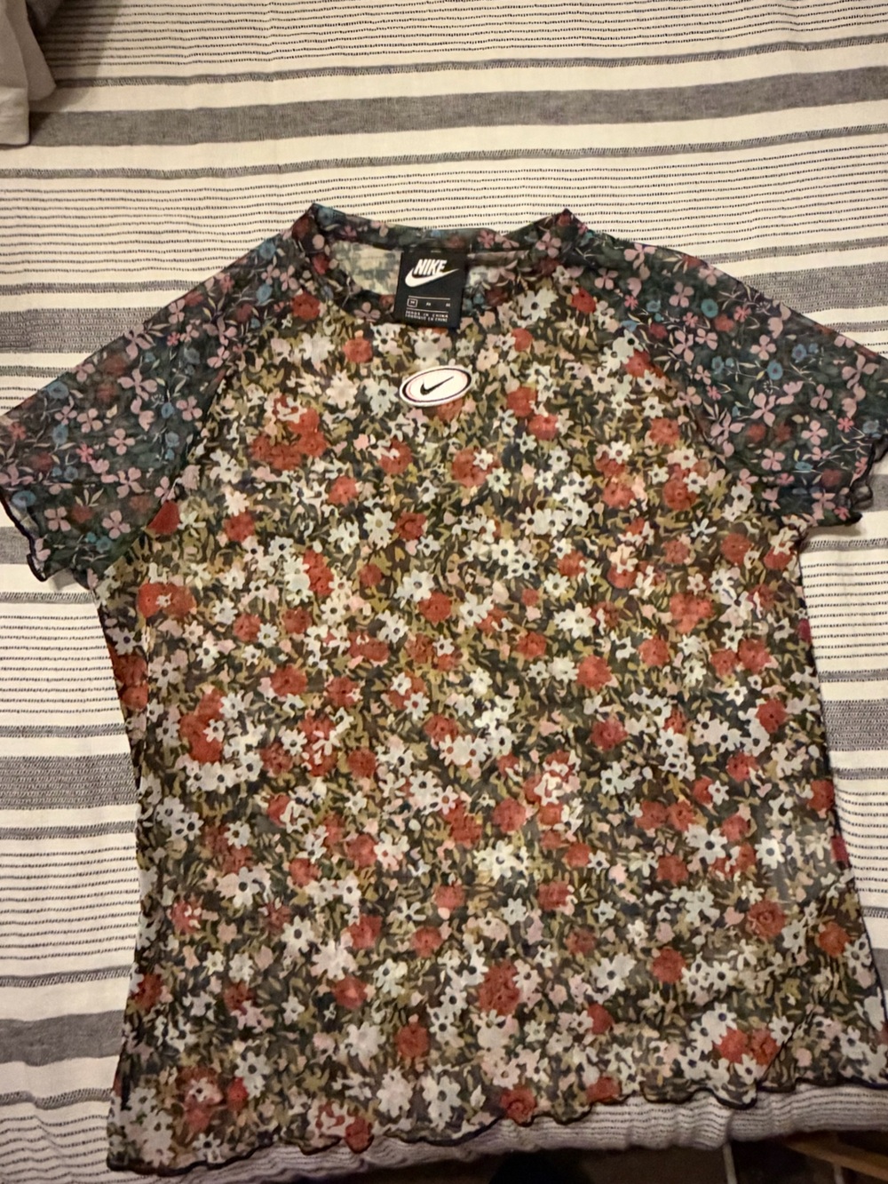 Nike Floral Mesh Short Sleeve Top in Black & Pink